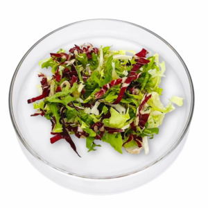 Das Bild zeigt den Mischsalat Paris auf einem flachen Glasteller